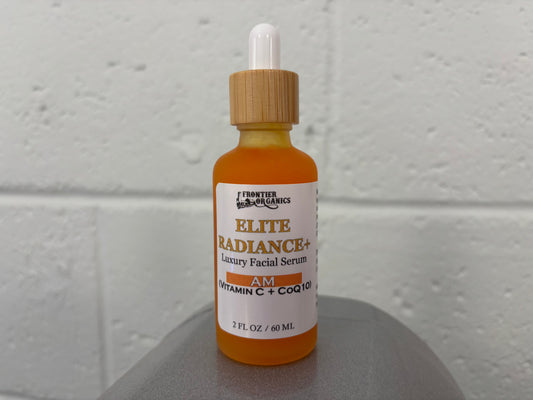 Elite Radiance+ AM vitamin C and CoQ10 facial serum in a 2 fl oz dropper bottle