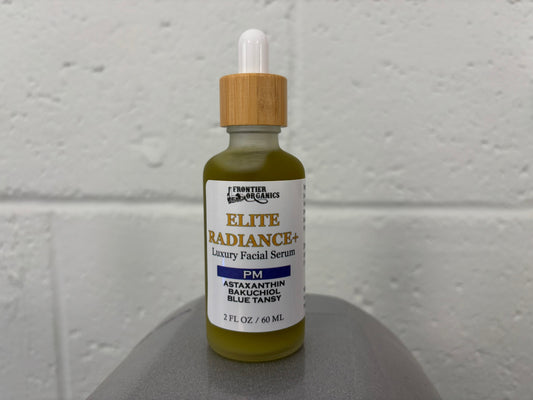 Elite Radiance+ PM facial serum with bakuchiol, astaxanthin and blue tansy in a 2 fl oz bottle